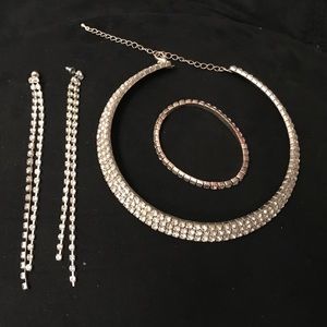 Rhinestone chocker, earrings and bracelet.
